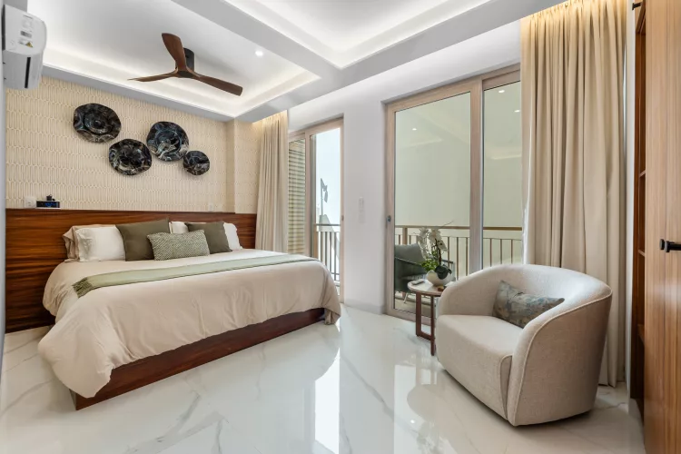King-size bed with blackout curtains in ARTEE Studio 203